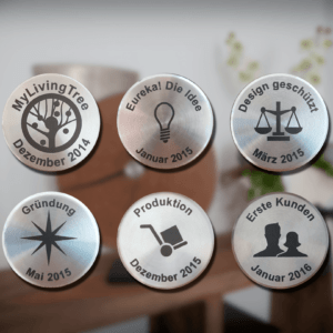 MyLivingTree Meilensteine Produktkollektion – verschiedene gravierte Edelstahlmünzen mit Symbolen